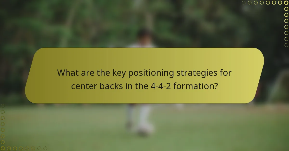 What are the key positioning strategies for center backs in the 4-4-2 formation?